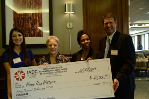 IADC Houston Chapter members present a check to Home Run Hitters International Left to Right: Allison Fraser, Rowan; Marcy Sandell; Dr. Deborah Carr, TITLE at Home Run Hitters and Scott Gordon, Derrick Equipment.