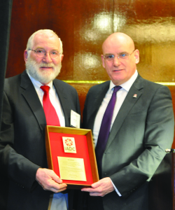 IADC President and CEO Stephen Colville recognizes Joe Hurt with the IADC Exemplary Service Award during the IADC Health, Safety, Environment & Training Conference and Exhibition in Houston on 3 February. Mr Hurt, IADC Vice President, Onshore Operations, retired in 2014.
