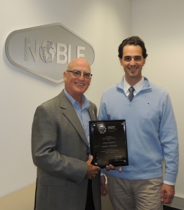 Derek Morrow, IADC Regional Representative, presented Kirk Atkinson, Noble Drilling with the Offshore Winners plaque at the Noble offices in Perth