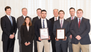First-ever IADC student chapter established at Texas A&M University. Students and faculty presented with certificate of organization during IADC Houston Chapter meeting in January. From left are Chris Menefee, Independence Contract Drilling; Andy Hendricks, Patterson-UTI Energy; Wendolyne Castillo, Treasurer, Texas A&M Chapter; Ron Lee, Noble Drilling; Zack Aldelamy, Secretary, Texas A&M Chapter; Dr Jerome Schubert, Texas A&M; Corey Wittig, Chairman, Texas A&M Chapter; Jason McFarland, IADC President; Zachary Matous, Vice-Chairman, Texas A&M Chapter.